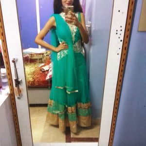 Green Vibrant Heavily Embellished Ethnic Gown