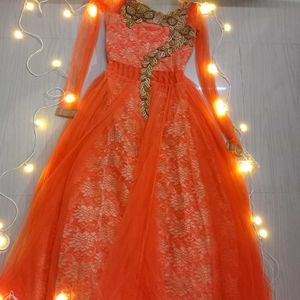 Orange color embroider gown for Women