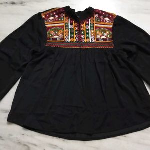 A Black Top With Good Or Excellent Quality