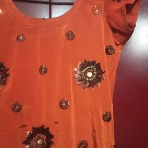 Dark orange Kurti with embroidery work