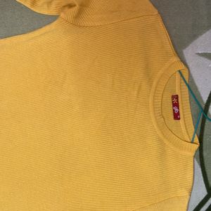 yellow sweater