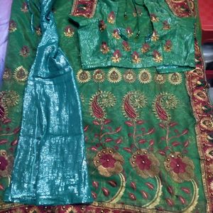 Green Heavy Net Saree With Blouse