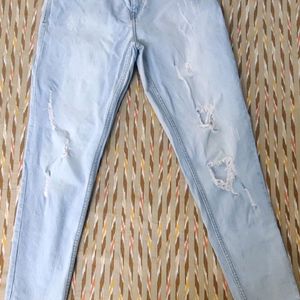 Distressed Blue Jeans With 4 Pockets