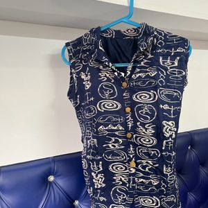 Navy Blue Sleeveless top with cut outs.