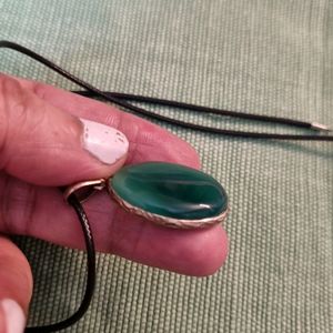 Green Oval Shaped Stone Pendant