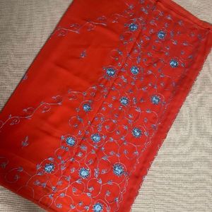 Orange Saree With Blue Shiny Embroidery