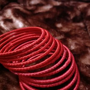 hand made silk thread  bangles. Colour - bright re