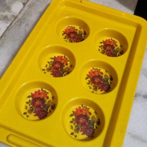 Yellow plastic tray