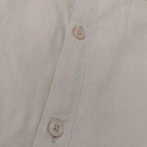 A Professional Shirt With Plain Tan Color