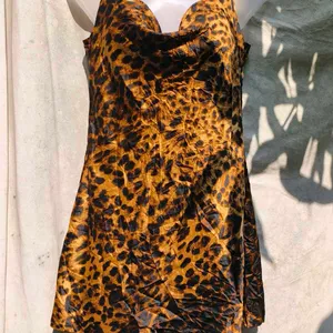 SEXIEST CHEETAH PRINT COWL NECK BODYCON