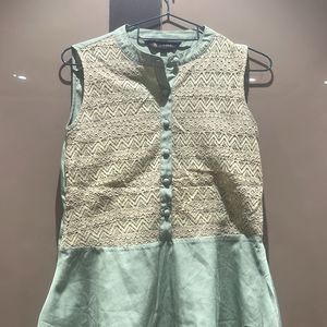 Green Sleeveless Top With Designer Neck