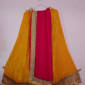 Rich Gold border Yellow lehenga with Pink dupatta