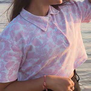 pink crop top t-shirt 💓its so comfortable t-shirt and it's look like beaches view give and very affordable t-shirt and 2 time wear and t-shirt conditions very very good