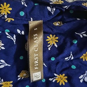 Its Navy Blue Top With White And Yellow Flowers