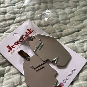 Contemporary High Fashion Silver Earrings