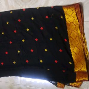 Black Red And Yellow Design Saree With Orange Par