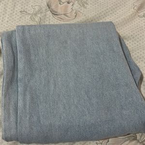 jeans which is powder blue in colour