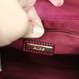 Aldo burgandy/Maroon Sling Bag