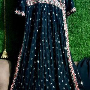 Beautiful embroidered Naira suit