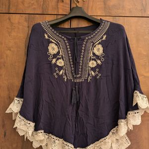 Very Cute Cape Top With White Embroidery