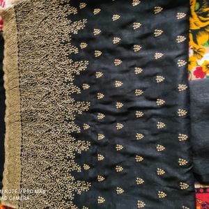 Black Party Wear Saree With Golden Jari Work