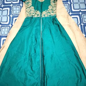 Peacock Green Coloured Gown With Skirt