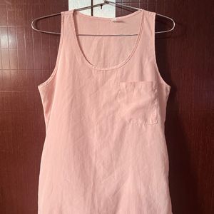 A Peach Colour Top.  Size:M.