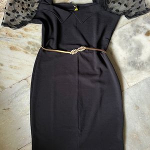 Black bodycon dress with puff sleeves