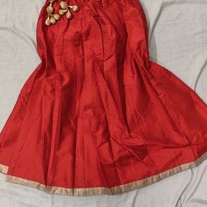 Red coloured plain skirt