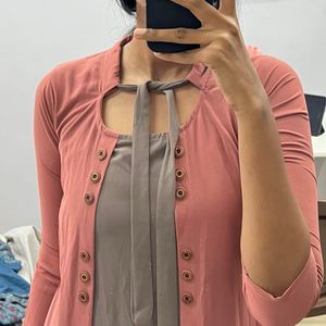 Stylish top with tie in good condition