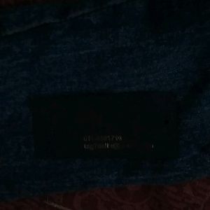 A Denium Jacket Pair With Blue Jeans