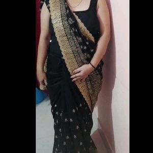 Black Party Wear Saree With Golden Jari Work