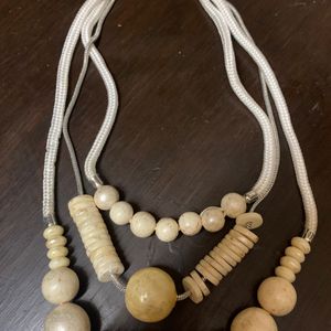 Very Elegant Off White Multi Layer Necklace