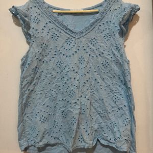 A Baby Blue Net Design Top