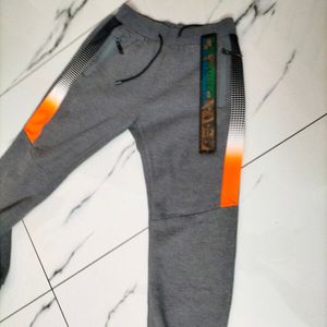 Grey ETEN joggers.