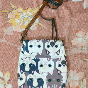 Kitty print sling bag