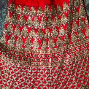 Unstiched Red And Gold Lehenga