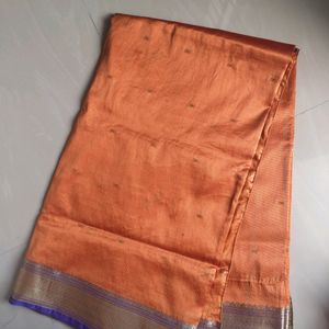 Orang And Blue Saree