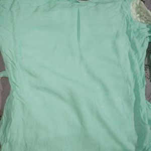 Top sea green colour with white sleeve round neck