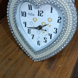 Beautiful heart shaped wall clock or table cloc