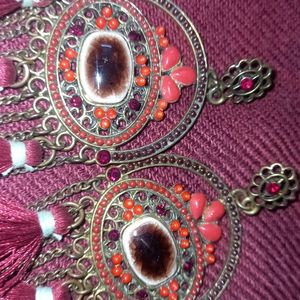 Maroon Fur And Stone Earnings