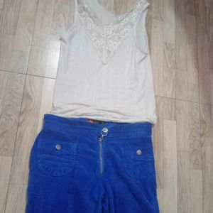 Blue Bell Bottom Jeans And White Tank Top