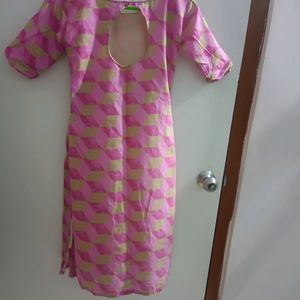 A pink Coloured stitched Kurti