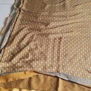 Saree With Stitched  Blouse