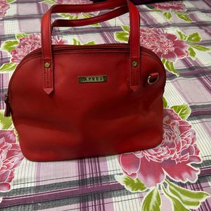 CAPRESE Red Sling Bag With Detachable Strap