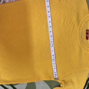 yellow sweater