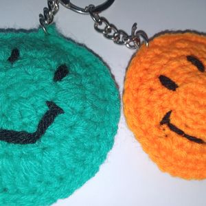 Pack Of Two Smiley Keychain Green And Orange