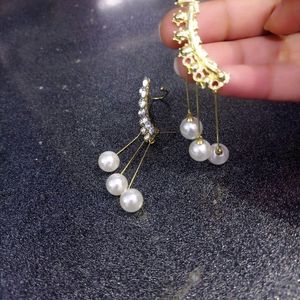 Zirconia Earrings With Dangling Pearls