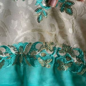 Half Green And White Saree With Stitched Blouse