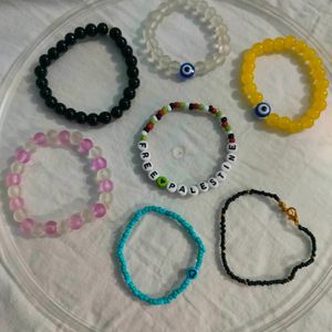 Handmade Bracelets With Glass Beads And Charms